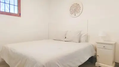 Cama o camas de una habitación en Cozy Apartment Yumbo Center