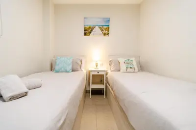 Cama o camas de una habitación en Apartamento Moderno Playa de las Canteras -Las Palmas Gran Canaria