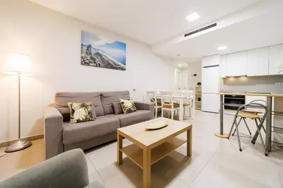 Zona de estar de Apartamento Moderno Playa de las Canteras -Las Palmas Gran Canaria