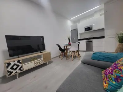 Una televisión o centro de entretenimiento en Piso Zona Mesa y López