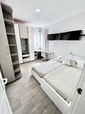 Cama o camas de una habitación en Apartamento en Ciudad Jardín