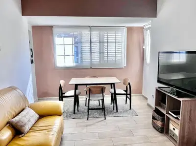 Una televisión o centro de entretenimiento en Apartamento en Ciudad Jardín