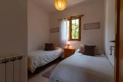Cama o camas de una habitación en La Casita de Don Enrique