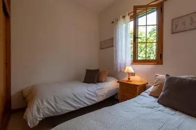 Cama o camas de una habitación en La Casita de Don Enrique