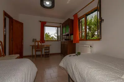 Cama o camas de una habitación en La Casita de Don Enrique