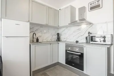 Una cocina o zona de cocina en Patalavaca Beach, One Bedroom Apartment