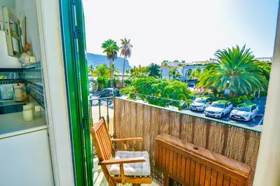 Un balcón o terraza de Casa Vivienne Perfectly Located Apartment With Roof Terrace In Puerto De Mogan Beach & Marina Gran Canaria