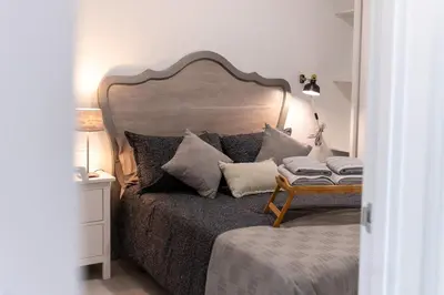 Cama o camas de una habitación en Camifa Canteras Beach Paradise - New stylish apartment just 1 minute from Las Canteras Beach fast WiFi