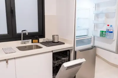 Una cocina o zona de cocina en Camifa Canteras Beach Paradise - New stylish apartment just 1 minute from Las Canteras Beach fast WiFi
