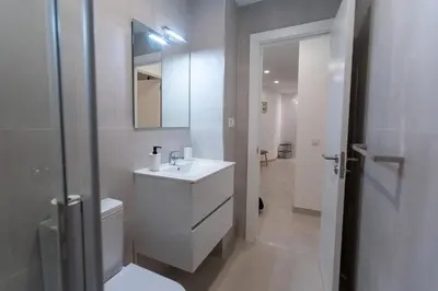 Un baño de Camifa Canteras Beach Paradise - New stylish apartment just 1 minute from Las Canteras Beach fast WiFi