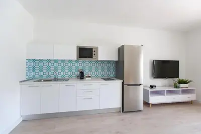 Una cocina o zona de cocina en Residencial Las Casas