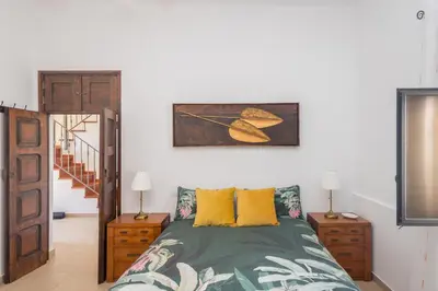 Cama o camas de una habitación en Moya Rooftop House - 3BR