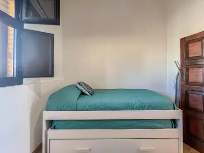 Cama o camas de una habitación en Moya Rooftop House - 3BR