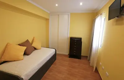 Una televisión o centro de entretenimiento en Apartment Vasco de Gama