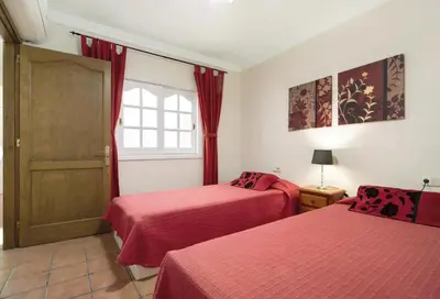 Cama o camas de una habitación en Casa Paca Maspalomas