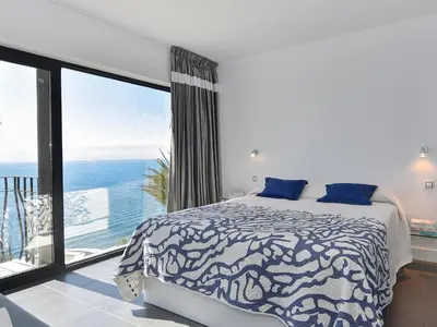 Cama o camas de una habitación en Seaside Suite 302 by VillaGranCanaria