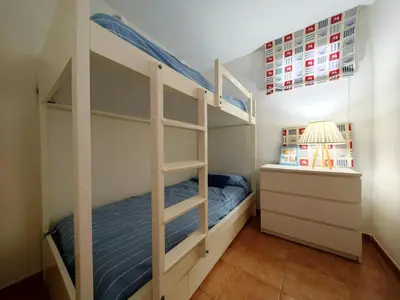 Cama o camas de una habitación en Gladiolos San Agustin Beach