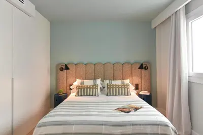 Cama o camas de una habitación en Neptuno Suite Playa by VillaGranCanaria