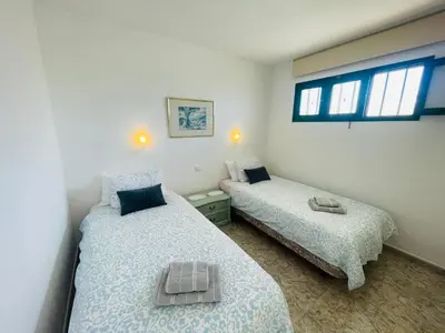 Cama o camas de una habitación en Sol y Dunas Mar Apartment