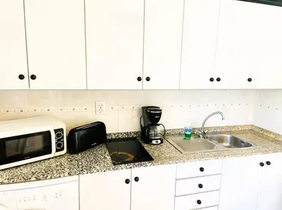 Una cocina o zona de cocina en Sol y Dunas Mar Apartment