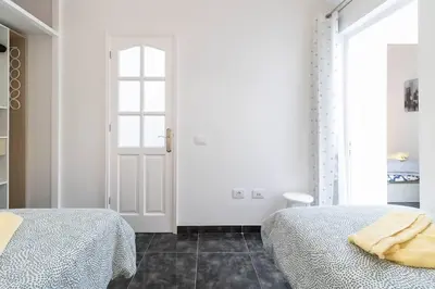 Cama o camas de una habitación en Casa Guaiza Gran Canaria