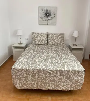 Cama o camas de una habitación en Casa de la Plaza San Mateo