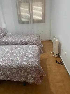 Cama o camas de una habitación en Casa de la Plaza San Mateo