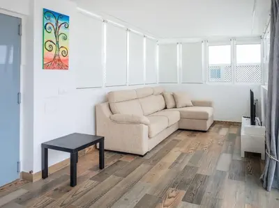 Zona de estar de Fantástico Ático Las Canteras