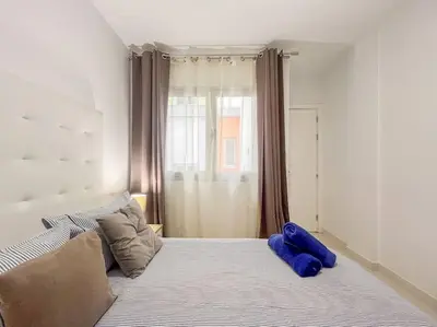 Cama o camas de una habitación en Piso Playa Las Canteras