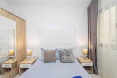 Cama o camas de una habitación en Piso Playa Las Canteras