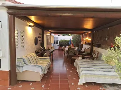 Zona de estar de Oasis Los Porches