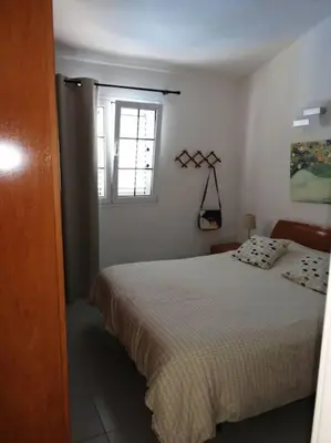 Cama o camas de una habitación en Oasis Los Porches