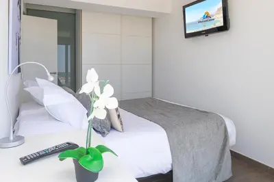 Cama o camas de una habitación en Nueva Suecia 515 by VillaGranCanaria