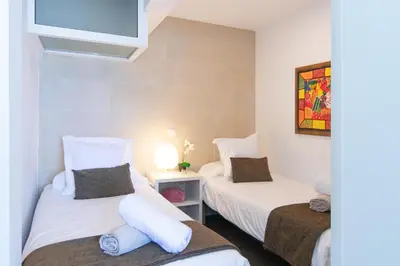 Cama o camas de una habitación en Nueva Suecia 515 by VillaGranCanaria