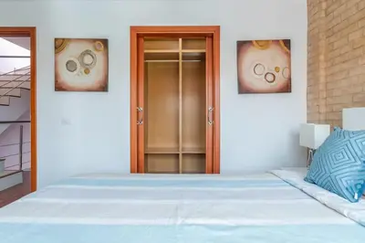 Cama o camas de una habitación en Encanto Arinaga