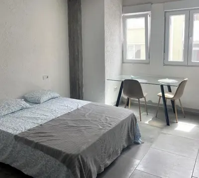 Cama o camas de una habitación en Hospedaje Cartagena