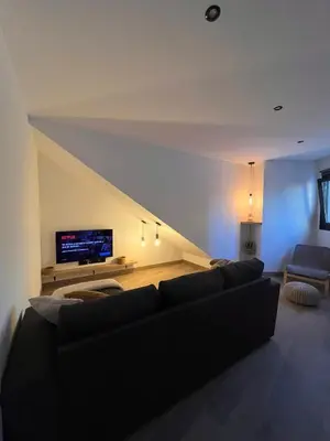 Una televisión o centro de entretenimiento en Apartamento Peña