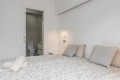 Cama o camas de una habitación en Escondite Sereno - 50m Las Canteras Beach