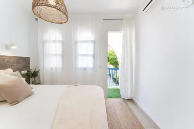 Cama o camas de una habitación en Isla Home