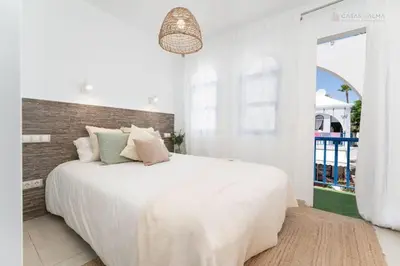 Cama o camas de una habitación en Isla Home