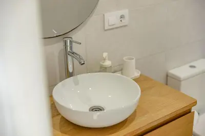 Un baño de Colorado Golf, Calma House - by Gestión Vacacional Canarias