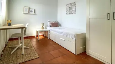 Cama o camas de una habitación en Harmony Beach Views Home with Terrace