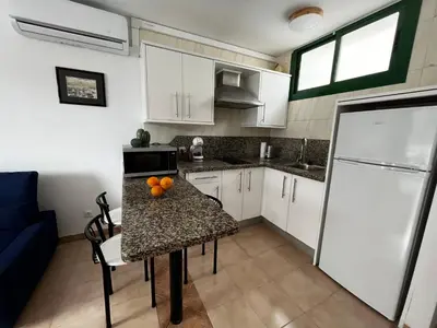 Una cocina o zona de cocina en Zwischen Yumbo und zentralem Strand