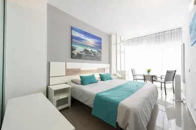 Cama o camas de una habitación en 1st Line Pretty Studio Las Canteras