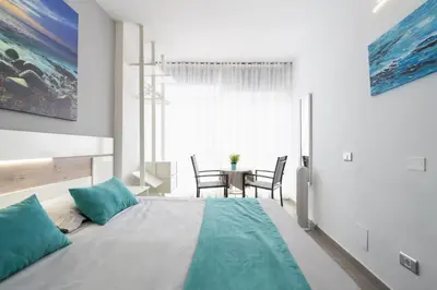 Cama o camas de una habitación en 1st Line Pretty Studio Las Canteras