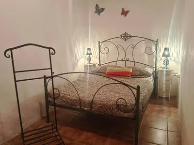 Cama o camas de una habitación en Casa García Pérez