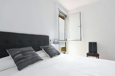 Cama o camas de una habitación en Seafront Terrace Home 2BR Las Canteras Beach