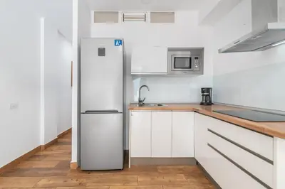 Una cocina o zona de cocina en Home2Book Cute Design Apt Las Canteras Beach