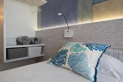 Cama o camas de una habitación en ApartHotel Idafe