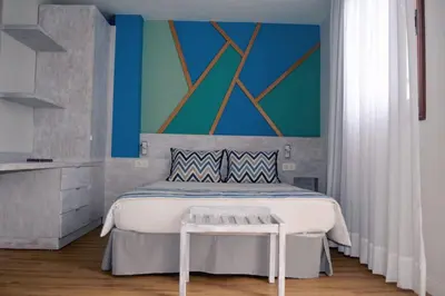 Cama o camas de una habitación en ApartHotel Idafe